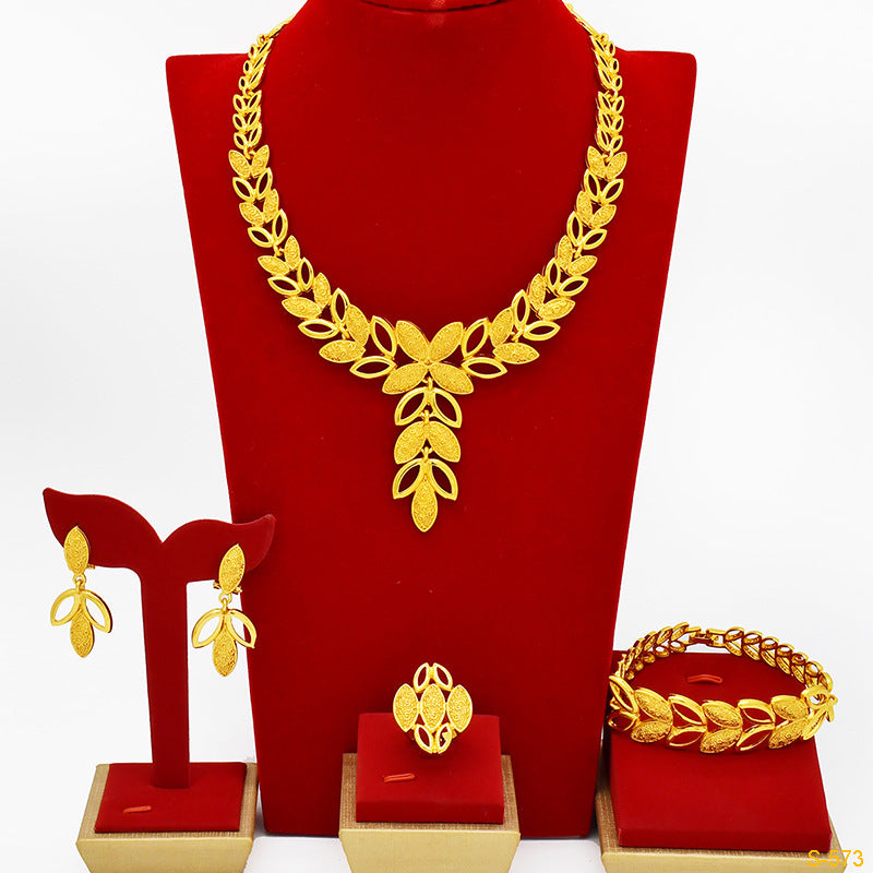 Renevo Hot Selling Dubai Gold Jewelry Middle East Women's Necklace Earring Ring Bracelet Not Easy to Fade Four-Piece Set in Stock